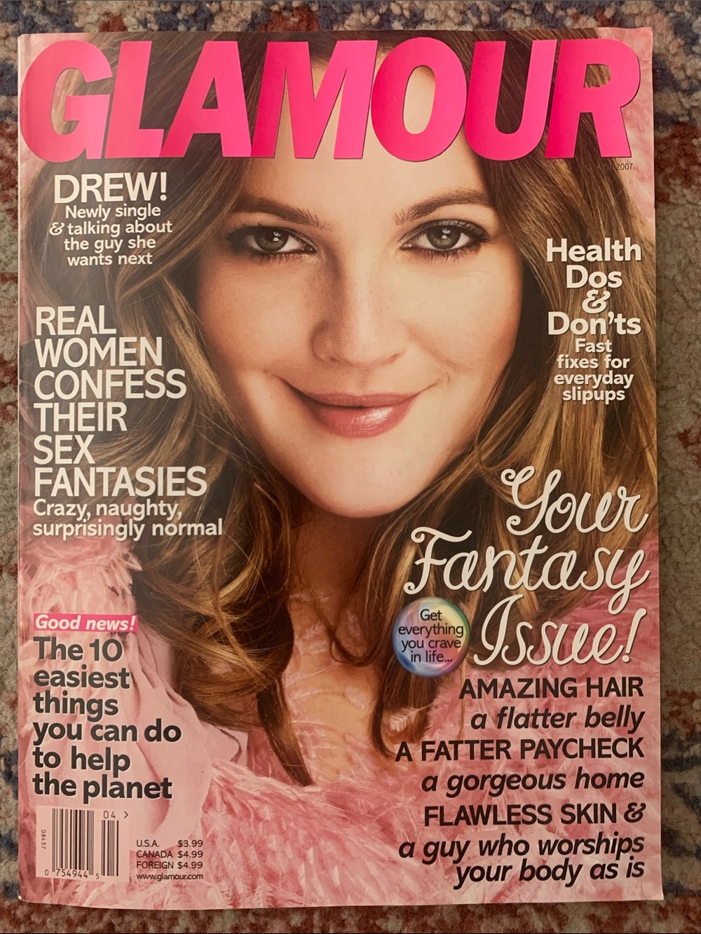 Glamour Magazine Cover with Hot Pink Masthead and Pink Feathered Outfit